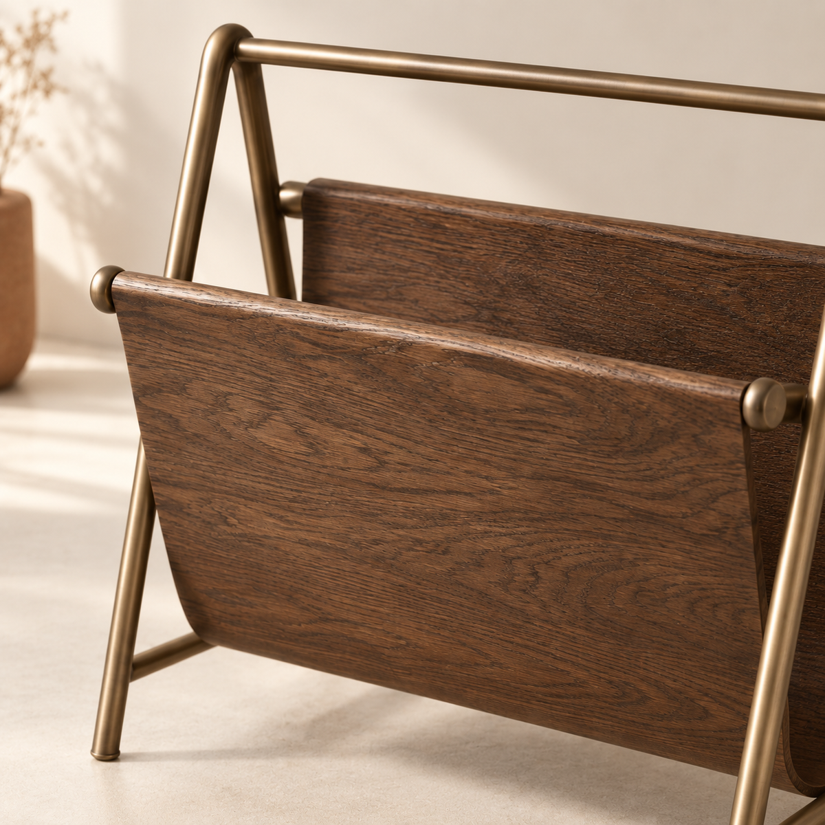 Forma Magazine Rack detail showing open frame and curved magazine bay